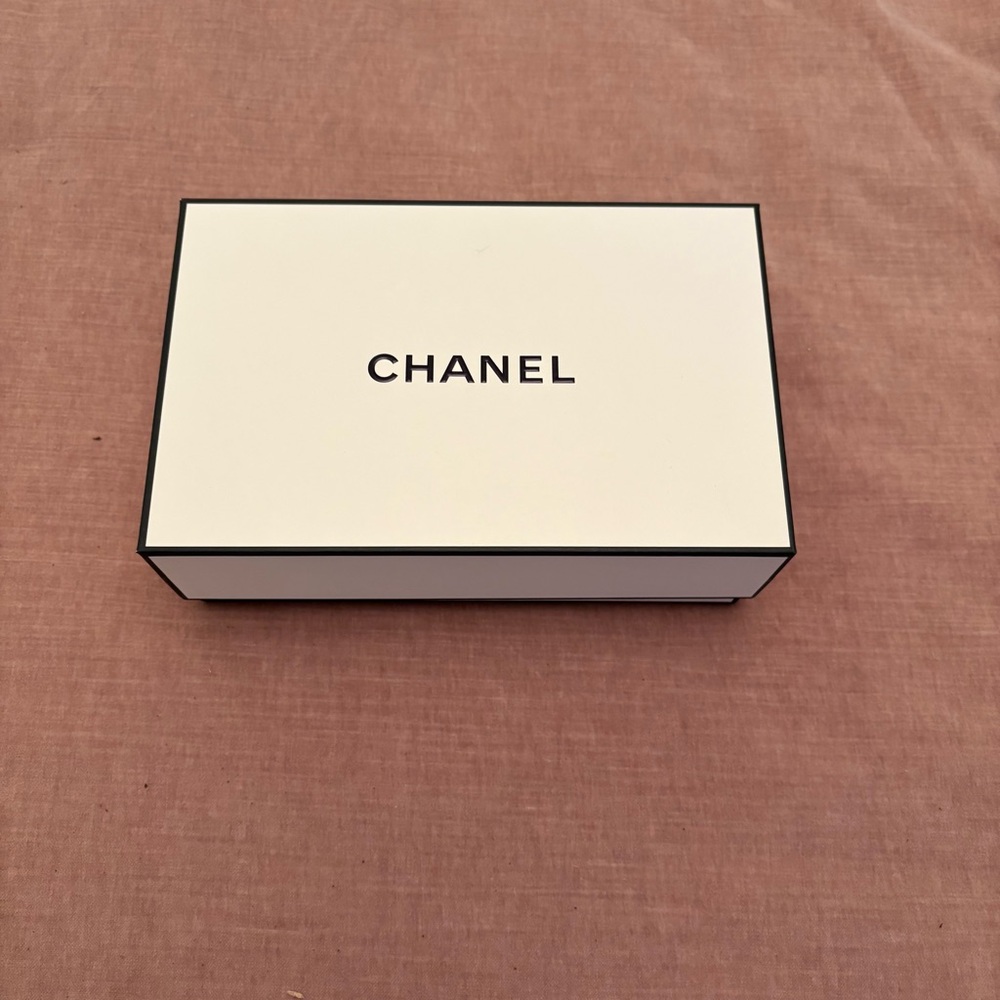 Chanel box; tissue, ribbon and note card